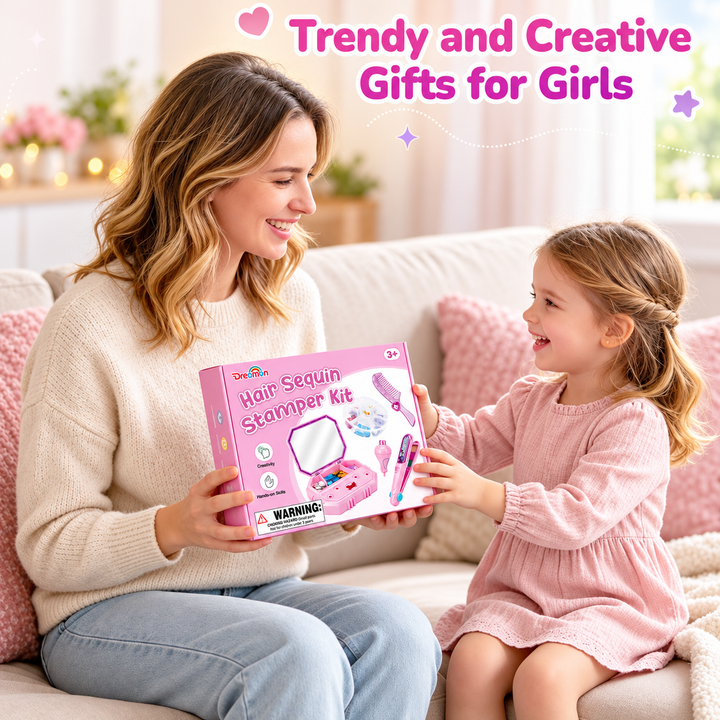A woman and a young girl smile while the girl receives a pink Hair Sequin Stampers Kit box from the woman in a cozy living room setting. The text &