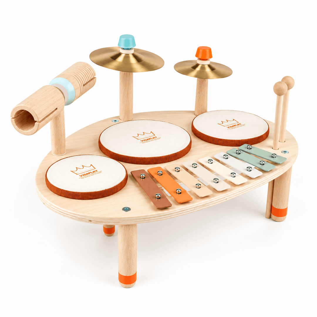 A wooden toy drum set with cymbals, drum pads, a xylophone, and mallets on a white background.