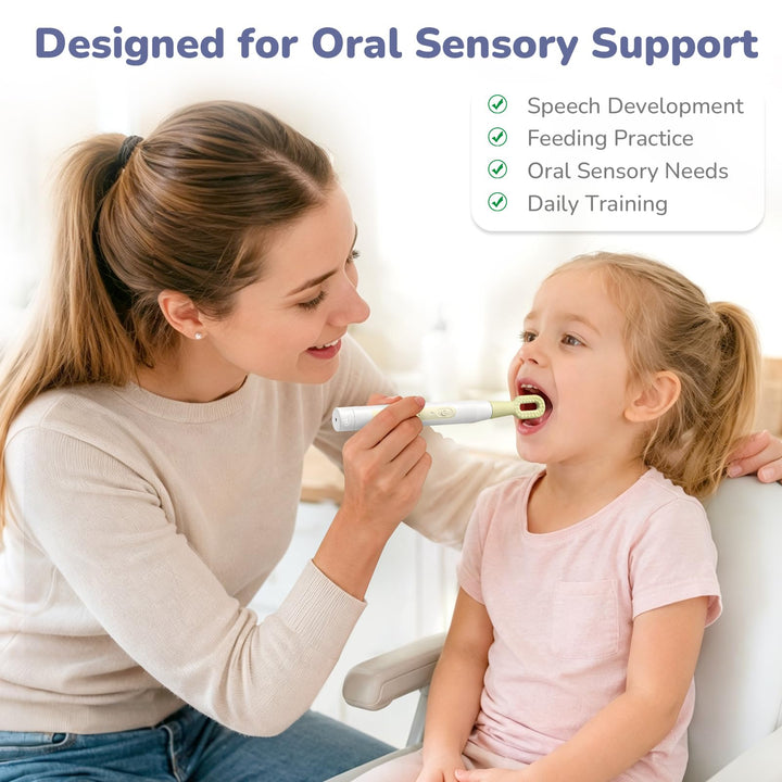 A woman brushing oral sensory support into a young girl&