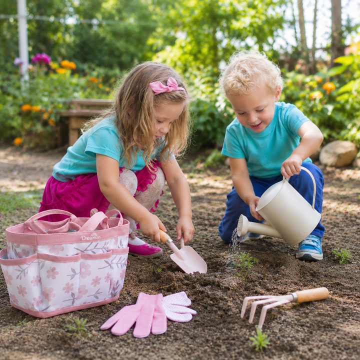 Children using gardening tools for hands-on outdoor play