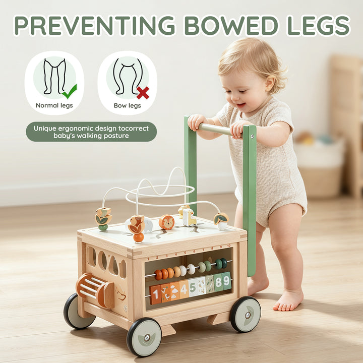 Child playing with a wooden push walker and interactive activities